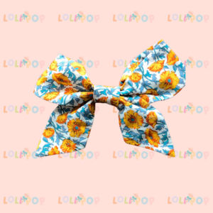 MOÑO CLASICO FLOR AZUL Y AMARILLO