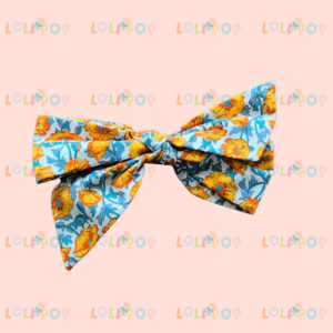 MOÑO LAZO FLOR AZUL Y AMARILLO